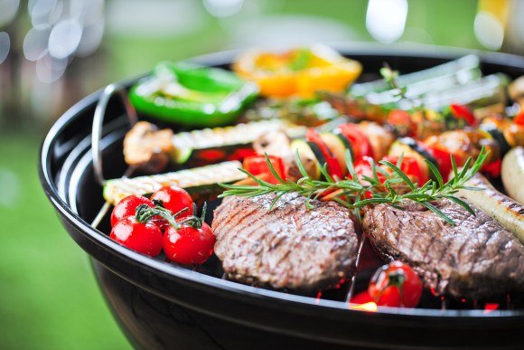 steak and vegetables on the grill